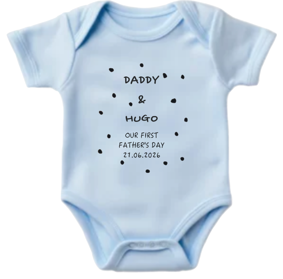 Light blue baby onesie with text and polka dots on a white background